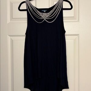Black (or very dark navy) sleeveless high low top